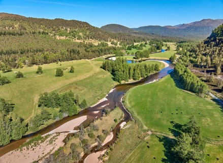 Aerial drone view of the course of Clunie River near Braemar, Cairn Gorms national Park, Scotland,