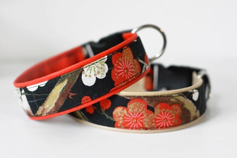 Handmade dog collars with cherry blossom floral fabric on white background