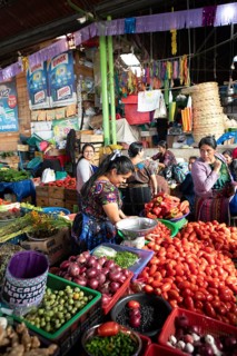 Mayan woman wearing traditional clothes at the market in Sololá, Highlands, Sololá Department,