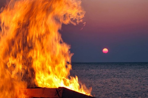 Easter bonfire, bonfire, on the beach, glowing flames, orange, yellow, motion blur, sunset, North