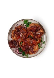 Fried, quail meat, tobacco (tapaka), with spices, on a white background, isolate, homemade, no