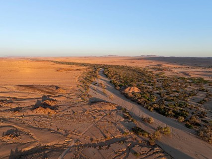 Aerial view, dry riverbed and desert landscape at Ugab River, Erongo, Damaraland, Namibia