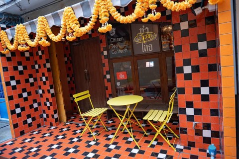 Bangkok, Thailand. August 20th 2026. A trendy colourful cafe with yellow table and chairs in the