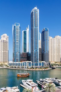 Dubai Marina skyline skyscrapers with yachts skyscrapers living on the waterfront in Dubai, United