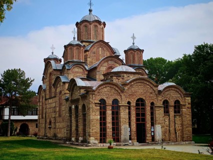 Serbian Orthodox Church, GRACANICA monastery, made of stone in a monastery complex with surrounding