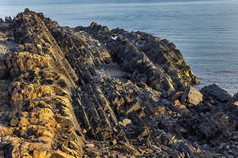 Gråhuken, Grey Hook, Cape Nud, Devonian-age Old Red Sandstone rock formations in the northernmost