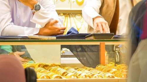 Dubai, UAE - 15th january, 2026:Close-up of gold bracelets in a display case at the Dubai Gold Souq