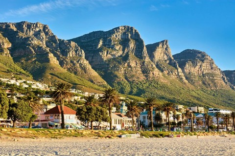 Beach in Cape Town, behind the rock formations The Twelve Apostles, Cape Town, Western Cape, South
