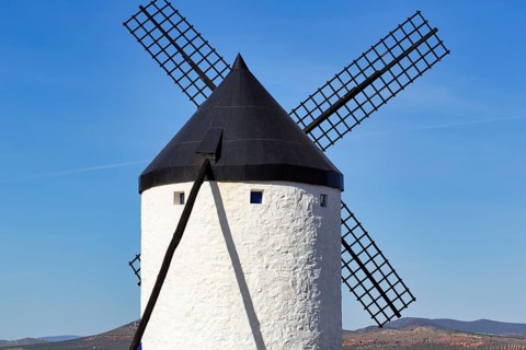 Historic windmill on a hill, blue sky, Consuegra, Route of Don Quixote, Toledo Province,