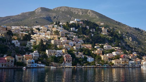 Hilly coastal town with colourful houses, Symi Town, Symi, Dodecanese, Greek Islands, Greece