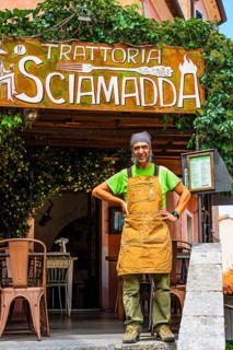 The landlord of the Trattoria Sciamadda, waiting for guests, mountain village of Poggio, Elba