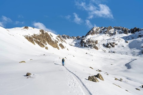 Ski tourers in a wintry mountain landscape, Bündner Haute Route ski tour, Albula Alps, Rhaetian