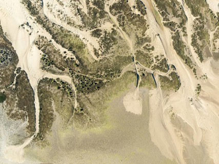 Sandy drifts at low tide at the Lago de la Gaviota (lake of the seagull). Aerial view. Drone shot.