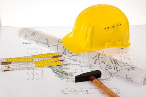 Construction plan for a residential building, drawings and plans by an architect, hammer, folding