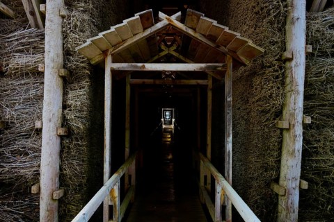 Long wooden walk through a dark graduation house, symmetrical and atmospheric, spa town of Bad Orb,