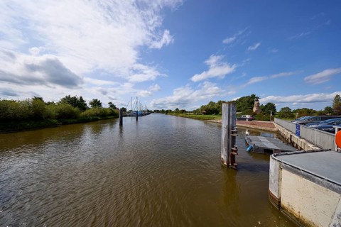 View from the lock towards the harbour in the town of Varel, district of Friesland, Lower Saxony,