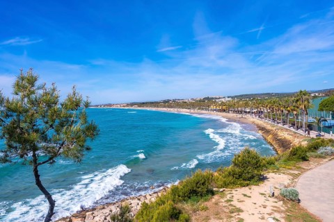 Scenic view of the cami de ronda coastal path stretching along the mediterranean sea towards roc de