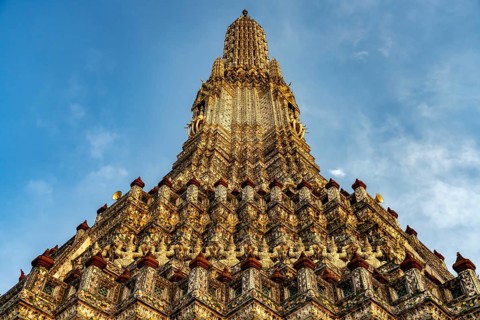 Prang of the Buddhist temple Wat Arun or Temple of Dawn in Bangkok, Thailand