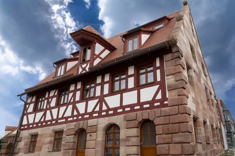 Former smithy with half-timbered upper storey and lift bay, dated around 1686, Laufamholzstraße 10,