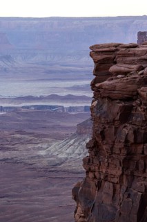 The rugged beauty of Canyonlands National Park at sunset, showcasing striking rock formations and