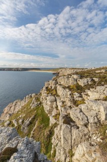 Rocky coast of Camaret-sur-Mer in the Finistère department in northwestern France, with a partly
