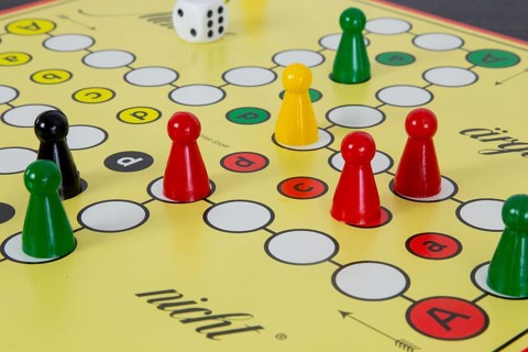 Close-up of the German board game MENSCH ÄRGERE DICH NICHT