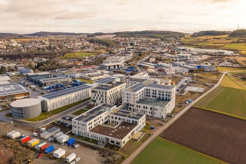 Extensive area with buildings and agricultural land, shortly in front of opening, Calw Health
