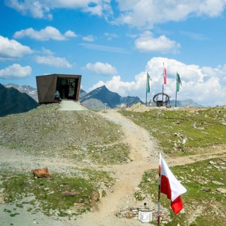 Pass of Alpine Pass Timmelsjoch Timmelsjoch-Hochalpenstraße with left concrete sculpture