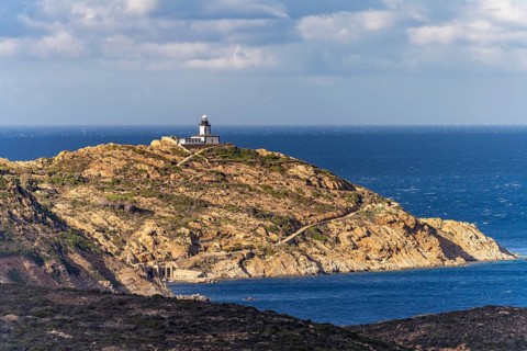The La Revellata peninsula with the Phare de la Revellata lighthouse near Calvi, Balagne, Corsica,