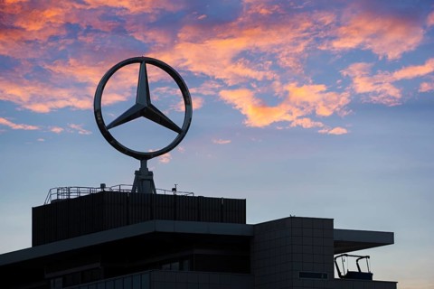Mercedes-Benz logo building with colorful sunset sky, Stuttgart-Untertürkheim, Baden-Württemberg,