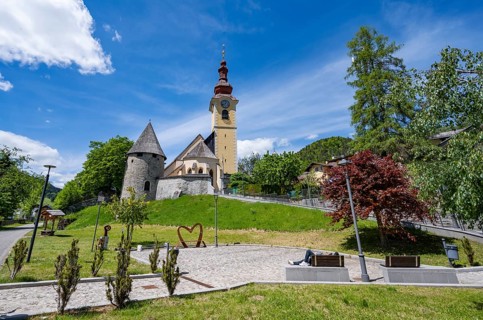 Church of Parrocchia dei SS. Pietro e Paolo Apostoli and medieval tower with old city wall,