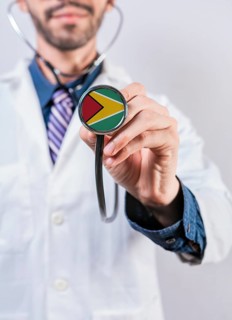 Guyana health and medical insurance concept. Guyana healthcare system, doctor holding stethoscope