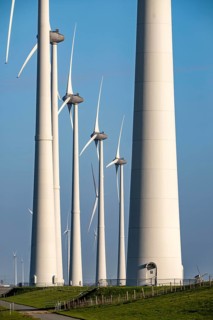 Wind farm in the north of the Netherlands, near Eemshaven, energy center, in addition to wind