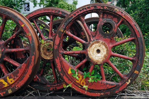 Discarded steam locomotive wheels on an overgrown siding, Ebermannstadt, Upper Franconia, Germany