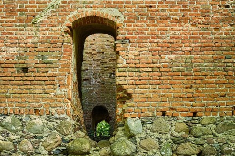 Historic fortified defence tower with wall opening, so-called Fangelturm in Nehringen, municipality