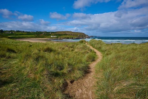 A trail through grass-fringed dunes with views of the coast and sea, Farr Bay, Bettyhill, Thurso,