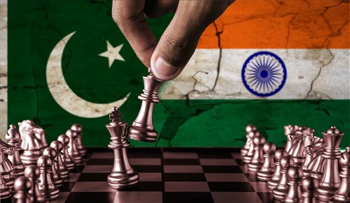 India vs Pakistan flag concept on chessboard. War between Pakistan and India. Conflict between