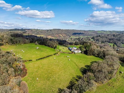 Farms and Woods over East Dartmoor National Nature Reserve from a drone, Yarner Wood, Lustleigh,
