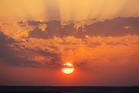 Dawn, sunrise on the horizon. Landscape with clouds near Frankfurt am Main, Hesse, Germany
