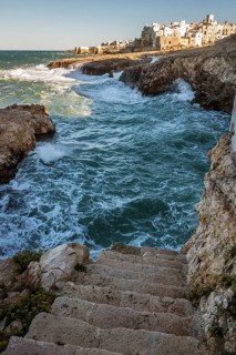 Stairs and seashore in Polignano a Mare, Puglia, Italy