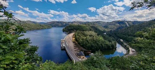 View from above of dam, Hohenwarte reservoir, landscape with a dam and a river, Saale, surrounded