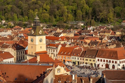 Pia?a Sfatului Council Square with Brasov or Kronstadt Town Hall Tower seen from above,