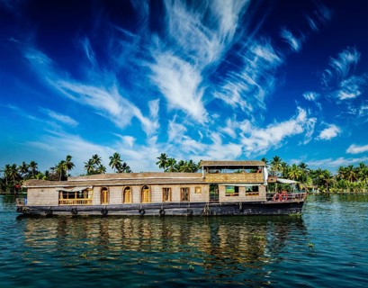Kerala India travel background, houseboat on Kerala backwaters. Kerala, India