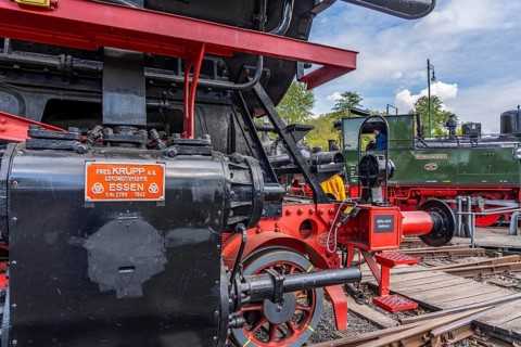 Freight train locomotive 044377-0, built by Krupp in Essen, ring locomotive shed with many historic