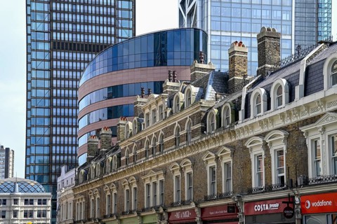 19th century Victorian row of houses in front of the Broadgate district office towers, Liverpool