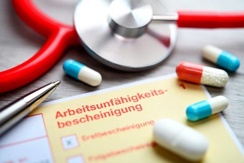 Certificate of incapacity for work with tablets and stethoscope, symbolic photo sick leave +++