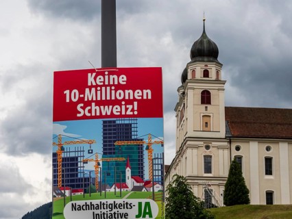 Poster of the Swiss referendum 2026, setting a limit on the number of inhabitants, Disentis,
