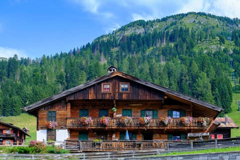 Old farmhouses in the hamlet of Kratten, Sappada, Plodn, Carnic Alps, Julian Friuli, Italy