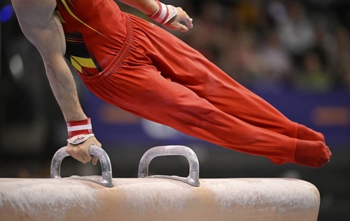 Feature detail close-up Senne Spyckerelle BEL pommel horse action gymnastics, EnBW DTB-Pokal,