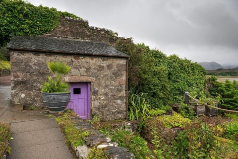 Old stone shed, Inverewe Gardens, one of the most northerly botanical gardens in the world, founded